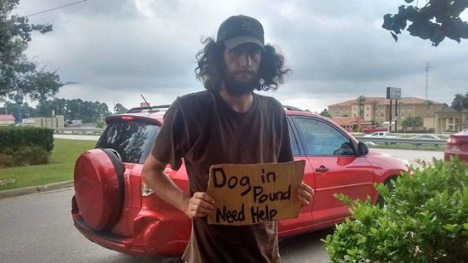 helping homeless man and dog