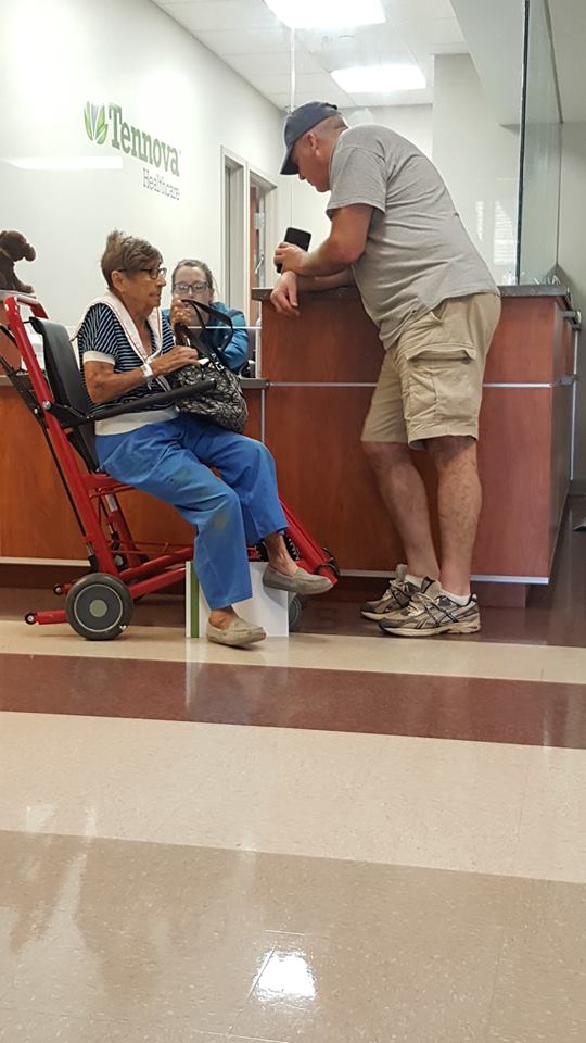 veteran helps old woman 
