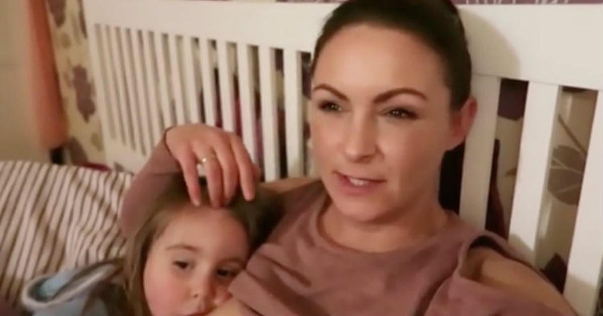 mother breastfeeds 4 year old