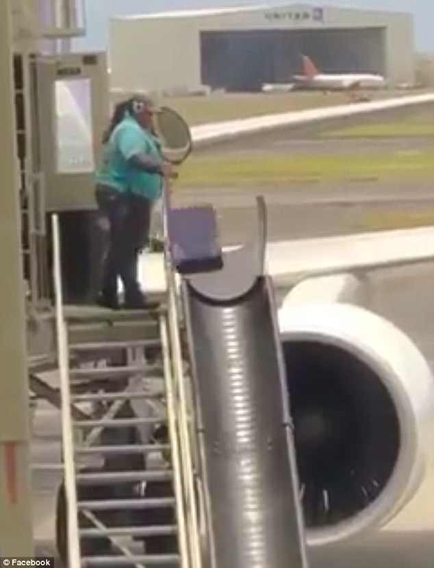 baggage handler throwing suitcases video